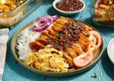 CRISPY PORK BINAGOONGAN ON COCONUT RICE PILAF